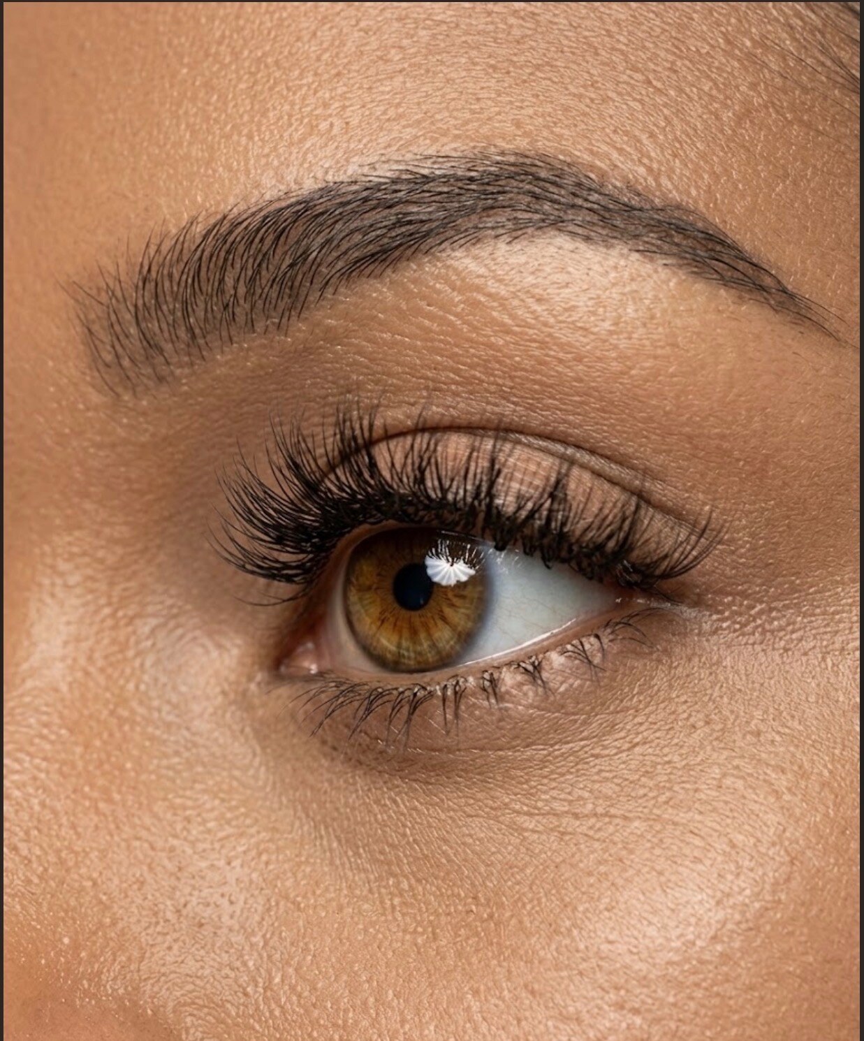 Close-up of a soft volume lash set by Blink Then Wink Lashes