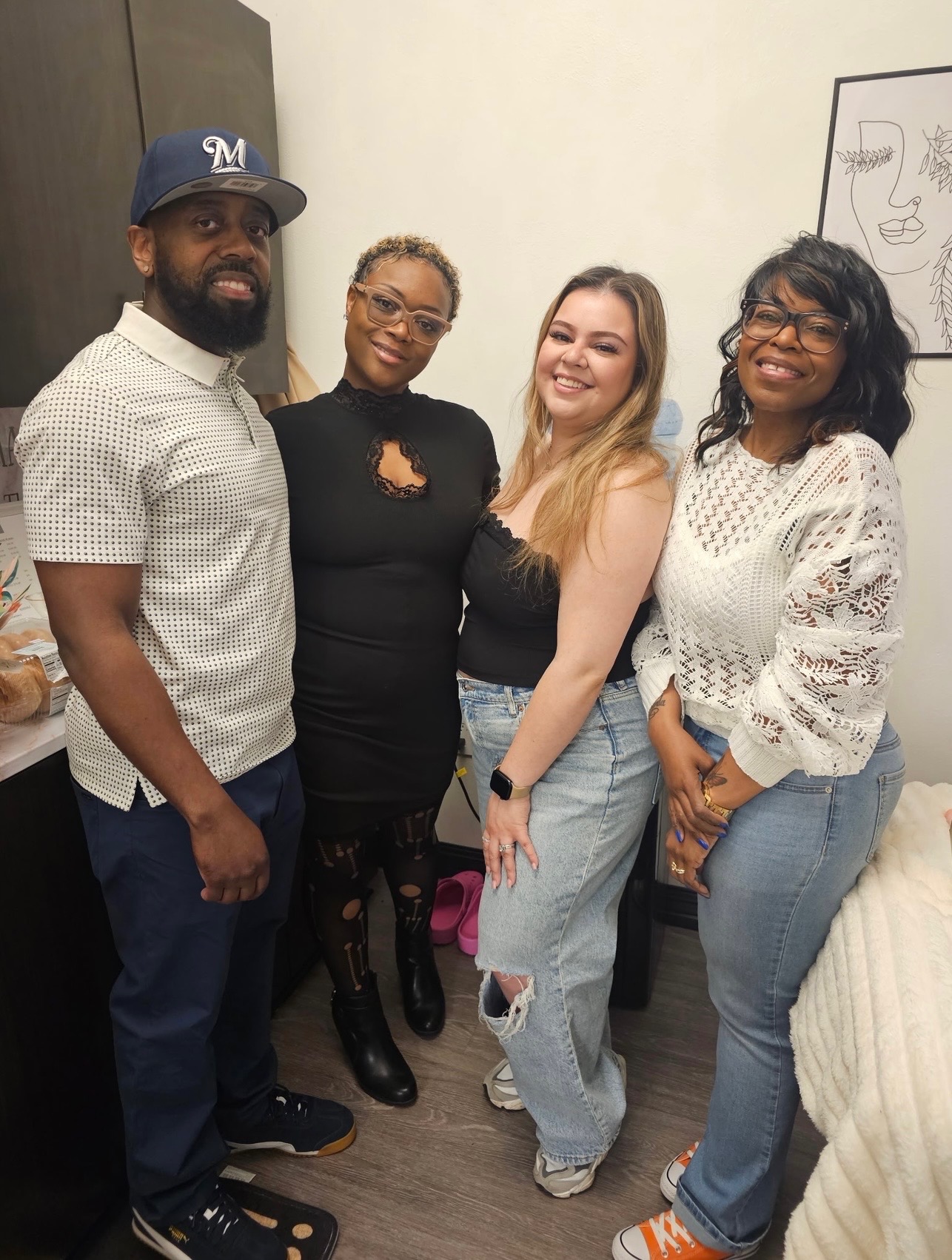 Constance gathered with guests inside the private lash studio